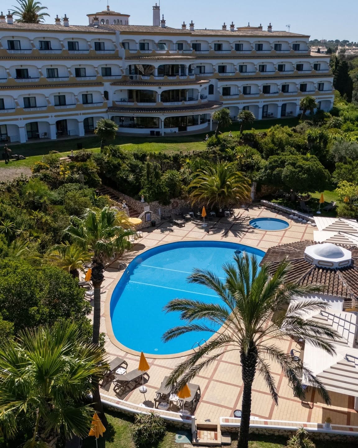 Hotel pool and grounds photographed from above